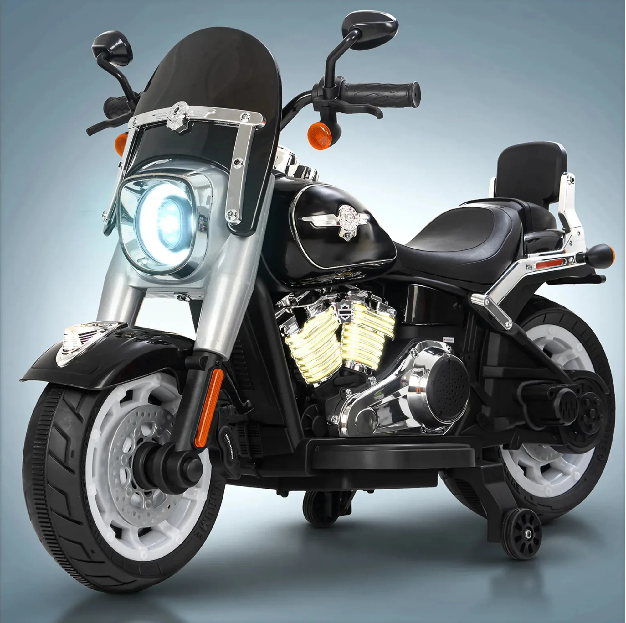 Black motorcycle with detailed engine on a gray background