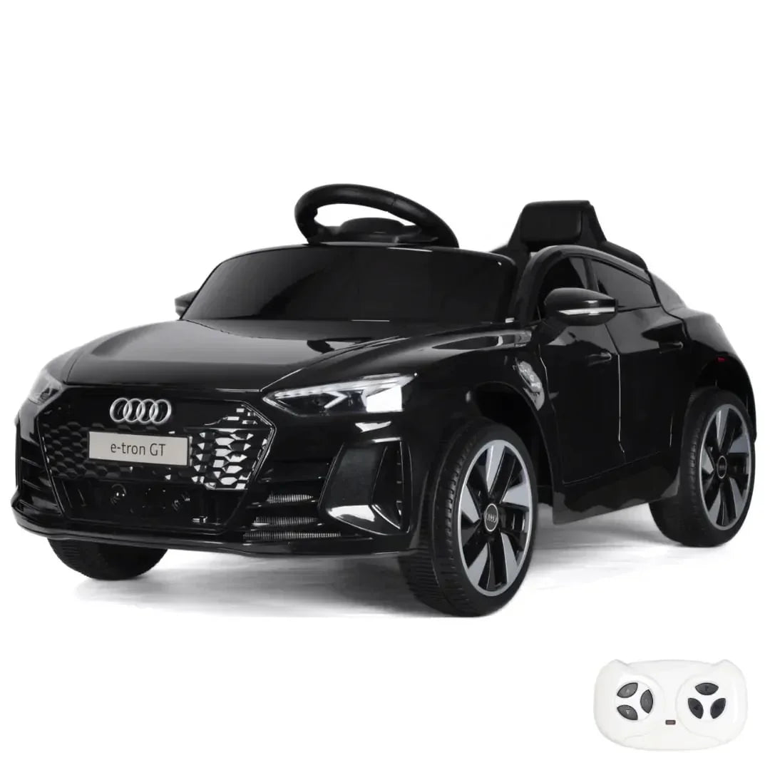 Black toy car with Audi logo on a white background