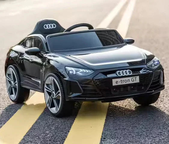 Black Audi e-tron GT toy car on a road
