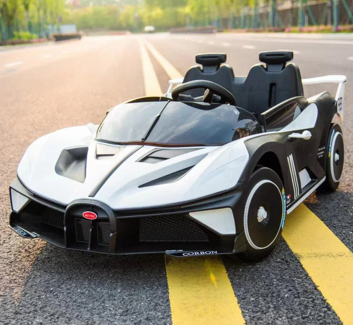 Children's toy car resembling a luxury sports car on a road