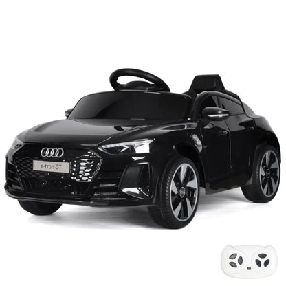 Black toy car with Audi logo on a white background