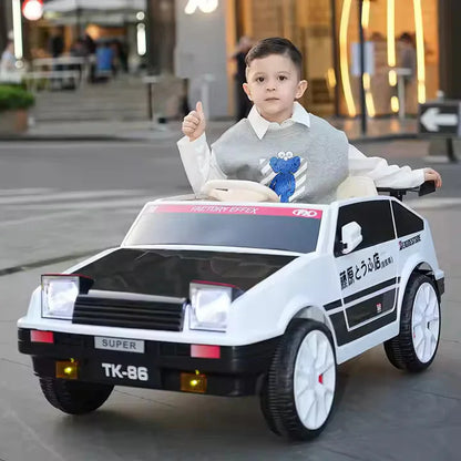 Child sitting in a toy car on a city street