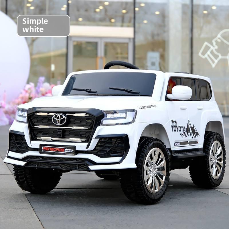 White toy car with Toyota branding on a sidewalk