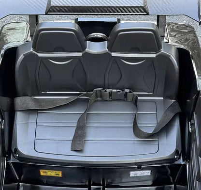 Gray seats with seat belts inside a vehicle