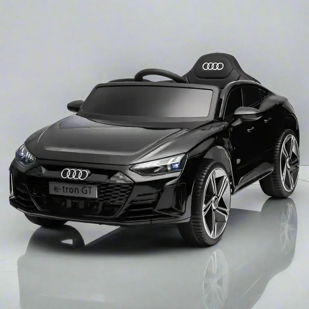 Black Audi e-tron GT toy car on a white background