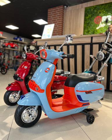 Battery-operated Vespa scooter for young riders