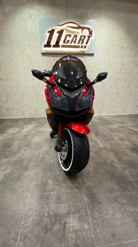 Kids’ 12V police bike with realistic decals, LED lights, and a functional horn
